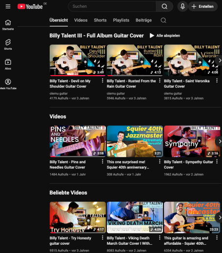 YouTube-Interface mit Musikvideos und einem Benutzer, der Gitarre spielt.